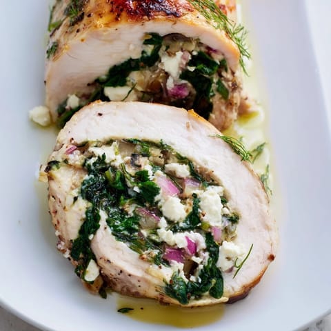 Savory Spinach Feta Stuffed Chicken rolls baked to perfection, ready to be served and enjoyed.