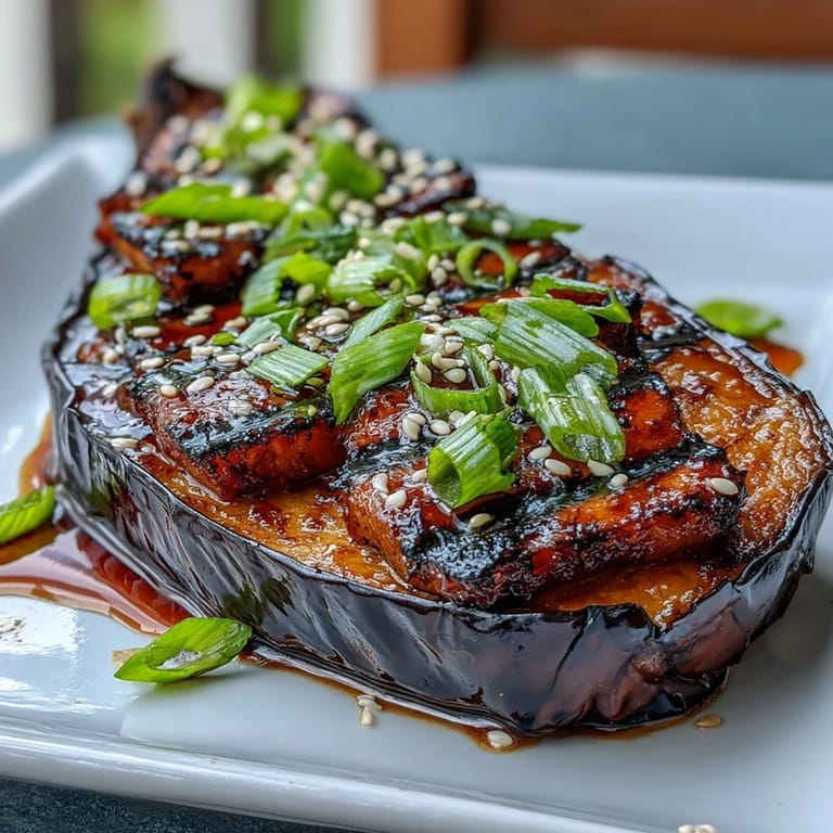 Savory Miso Glazed Eggplant, roasted until tender and topped with umami glaze.