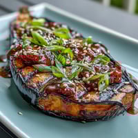 Miso Glazed Eggplant with caramelized topping, a delicious vegetarian side dish.