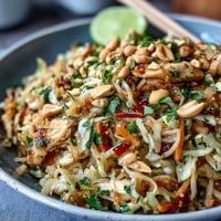 Vibrant Cabbage Pad Thai with peanuts and lime, a healthy, colorful low-carb dish.